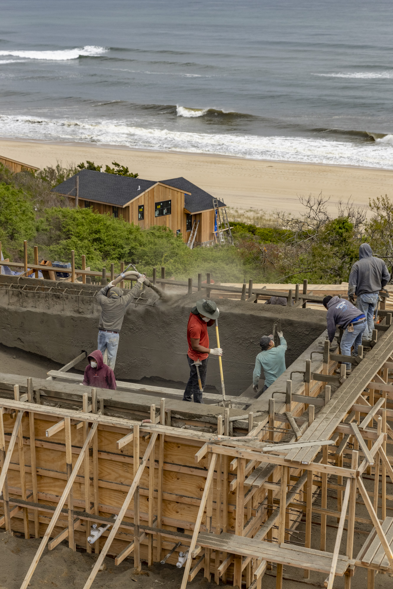 Constructing a pool by the beach in the Hamptons